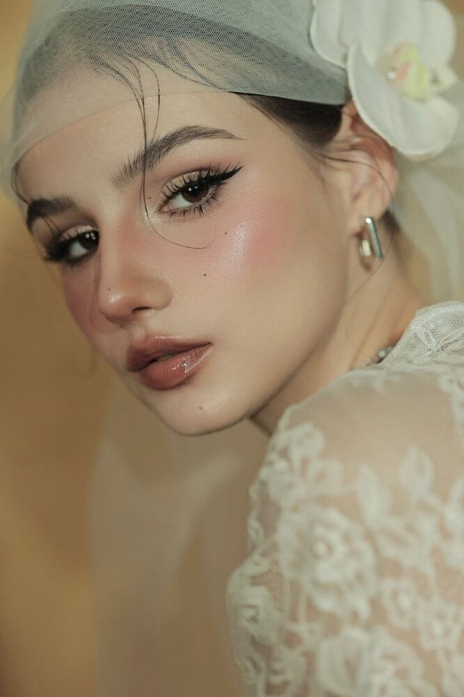 MARIA E.