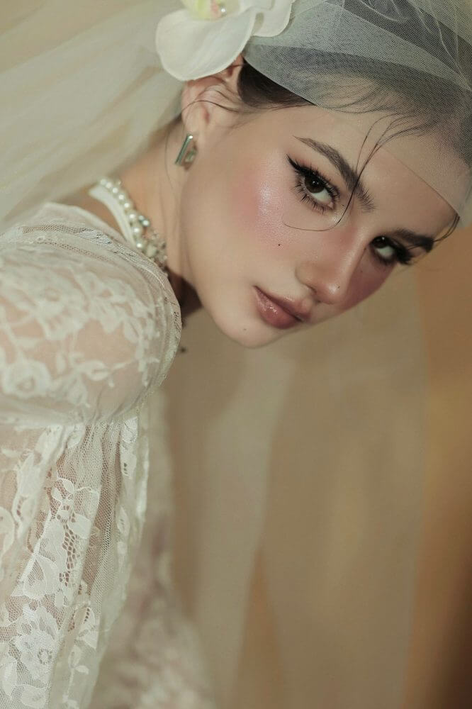 MARIA E.