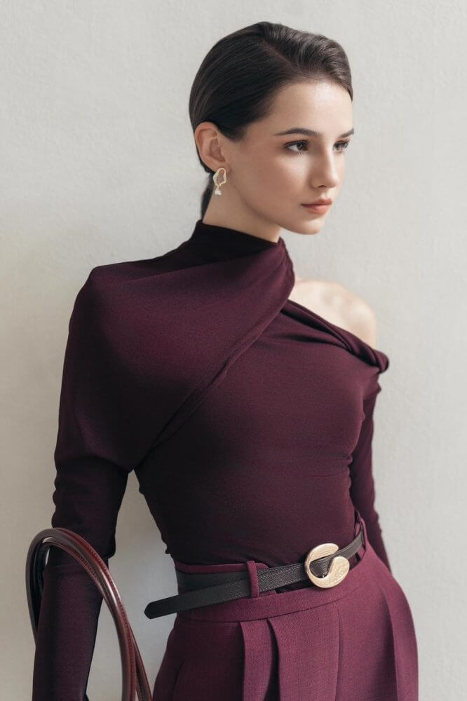 MARIA E.
