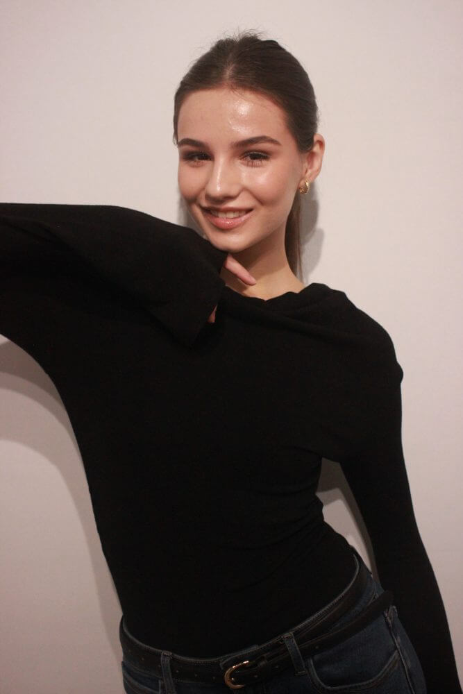 MARIA E.