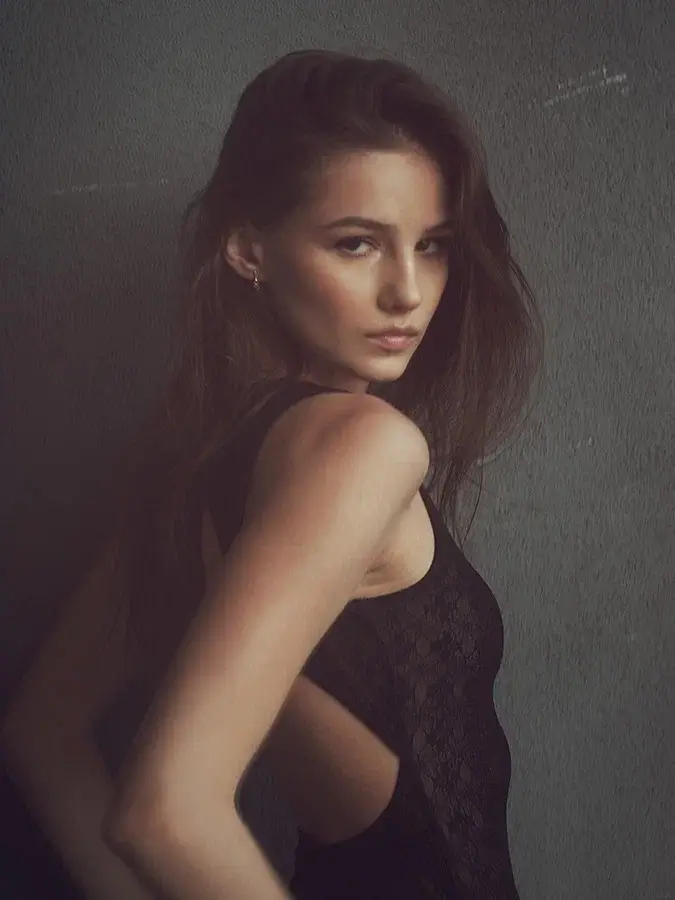 MARIA E.