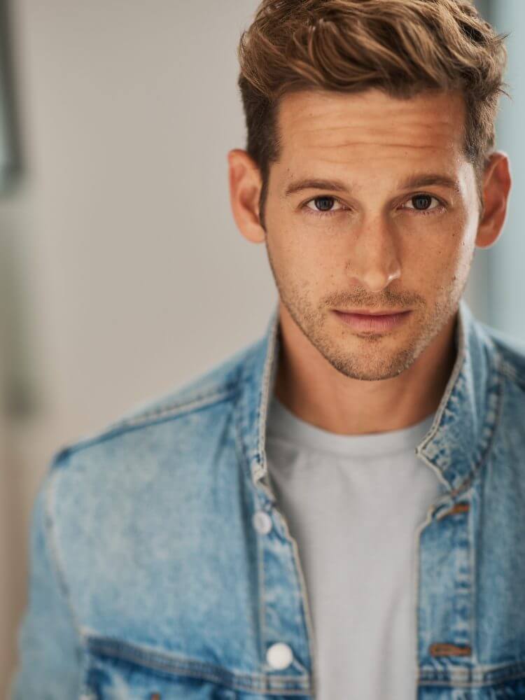 MAX E.