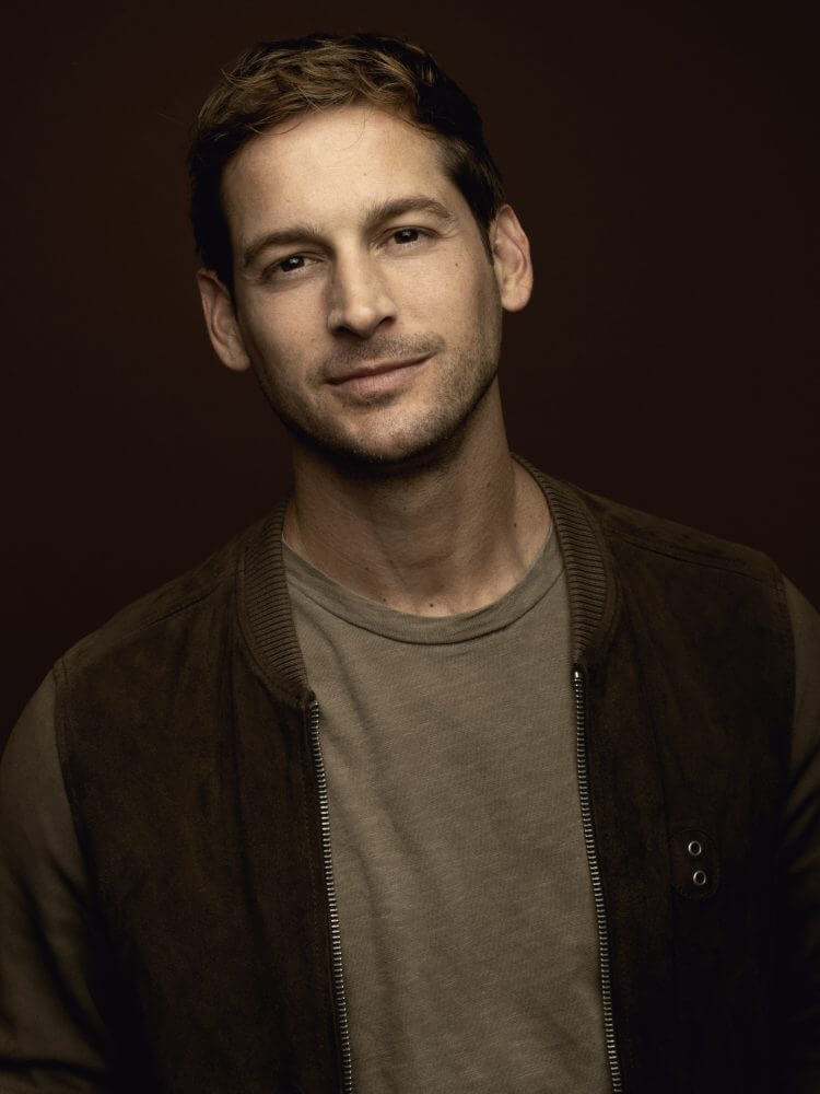 MAX E.