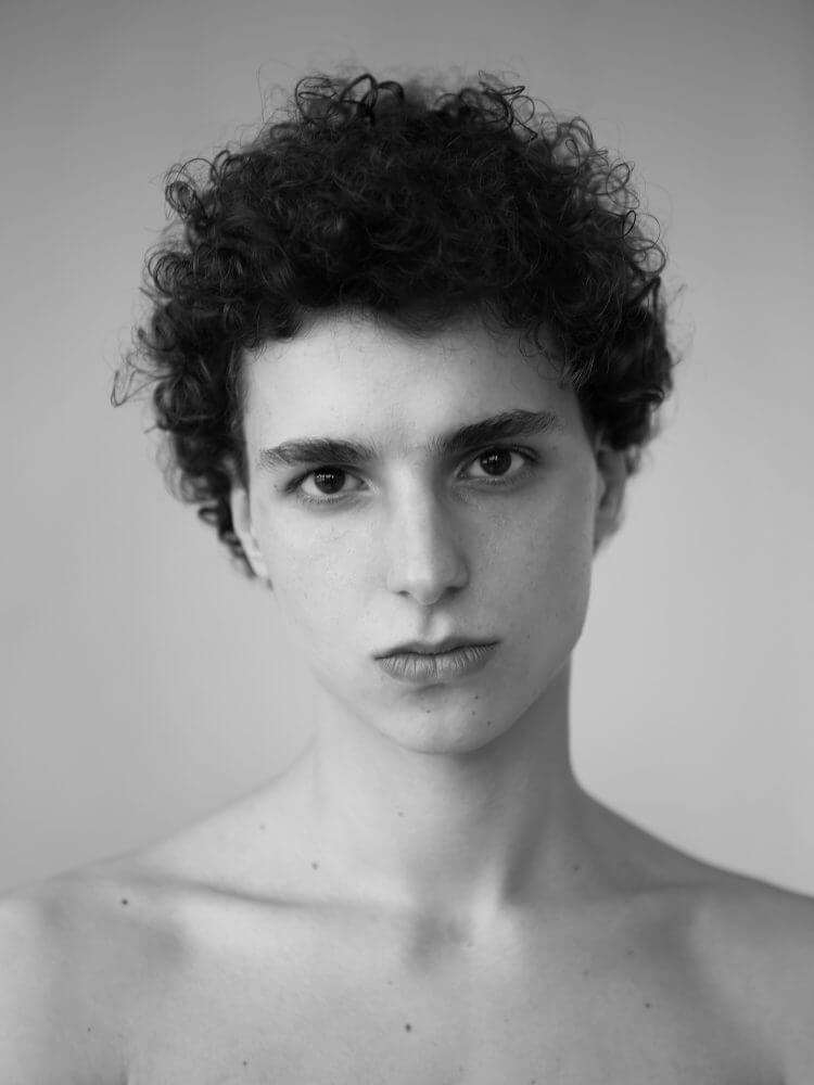 ACHILLE M.
